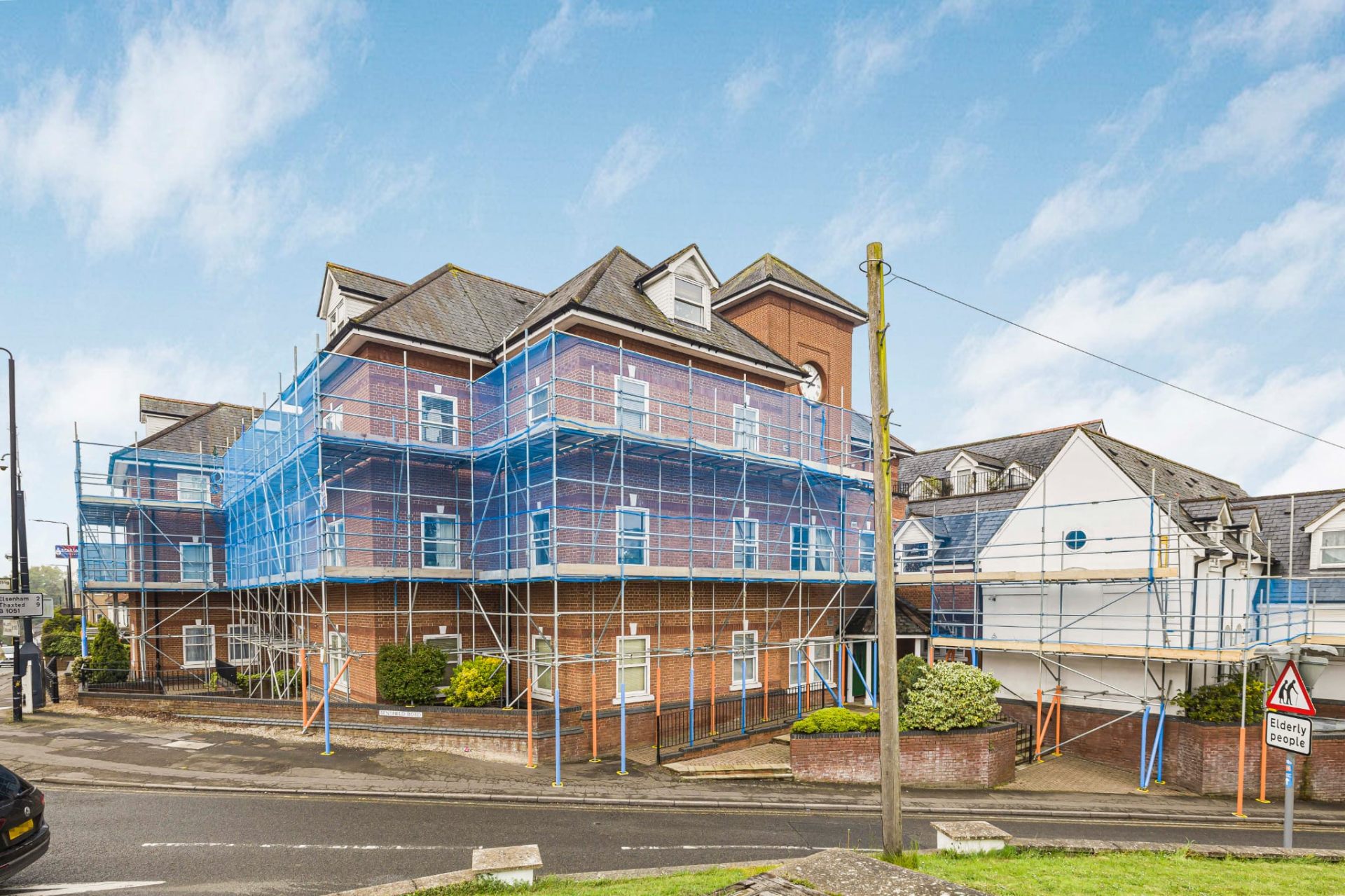 Multi-storey commercial scaffold on a street-corner property