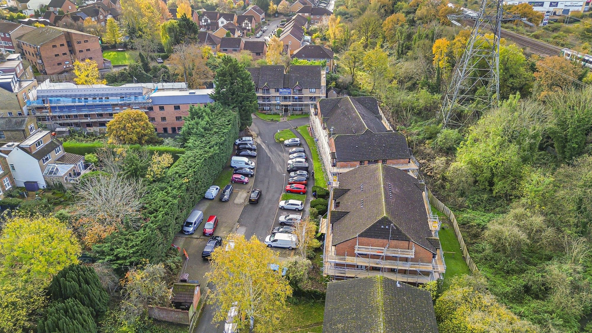 Aerial view of residential buildings under scaffold