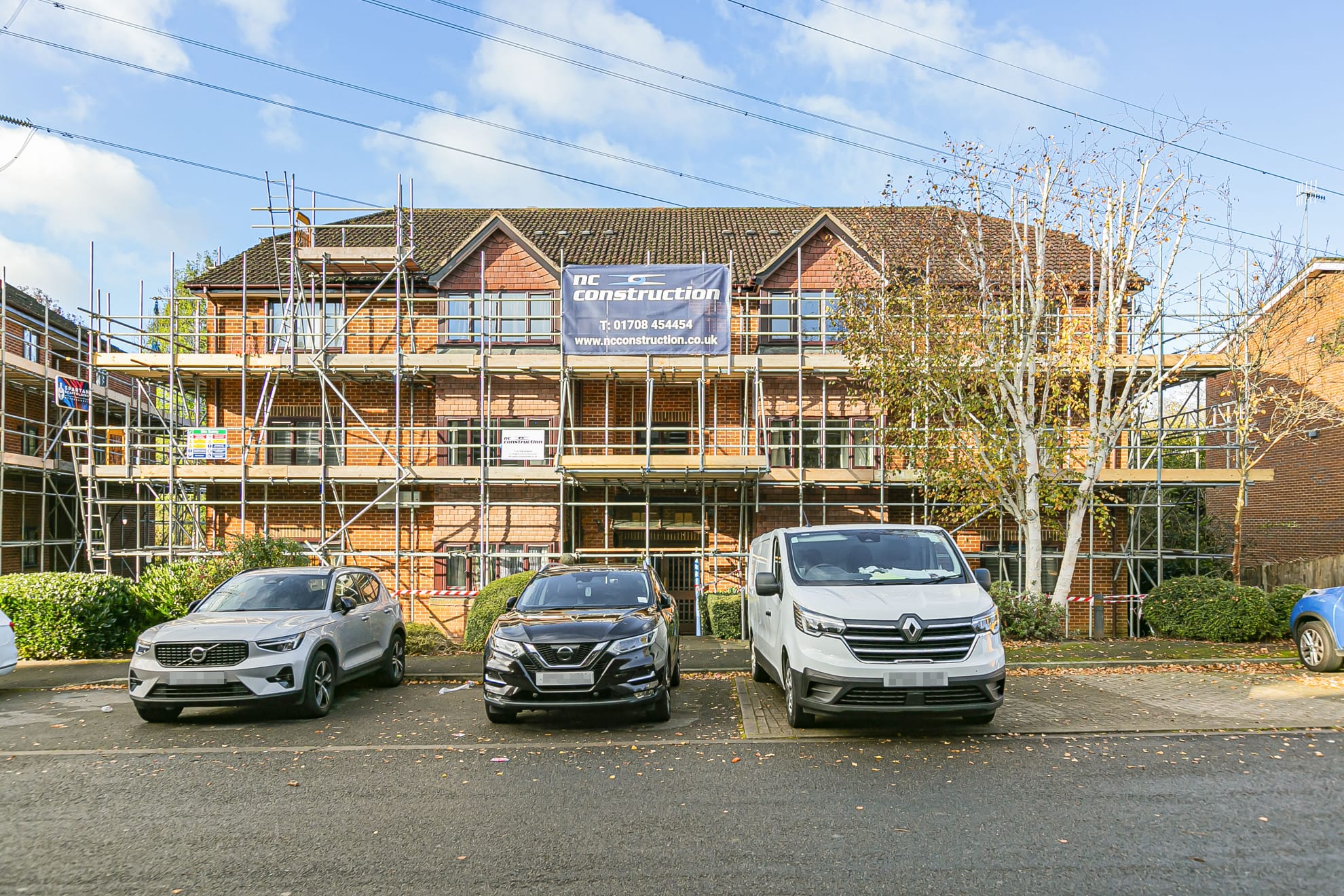 Apartment block scaffolded for exterior works