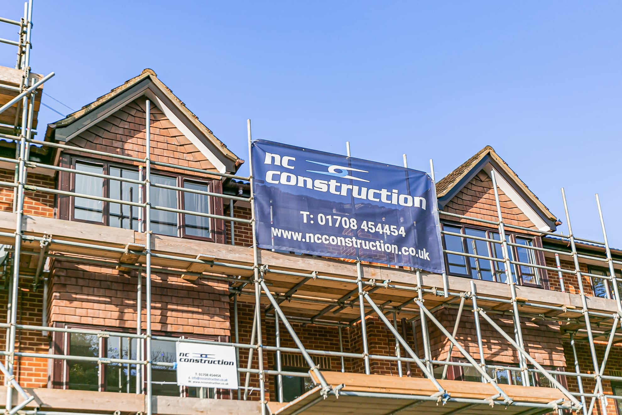 Three-storey domestic scaffold giving safe access to chimney stack