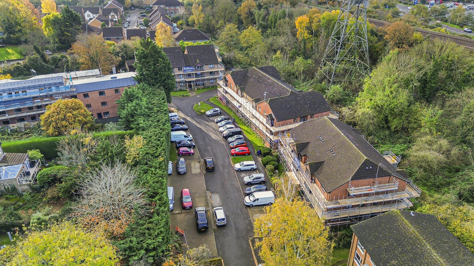 Aerial view of a fully scaffolded residential project