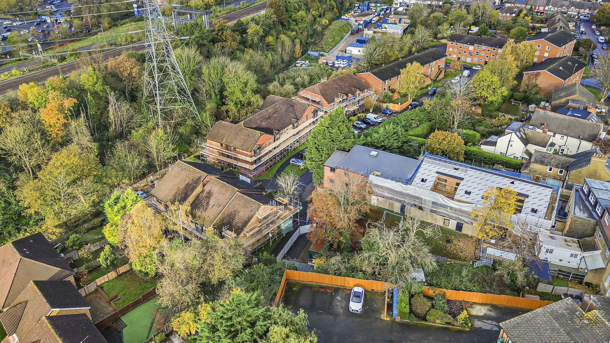 High-vantage view of a residential scaffold during a re-roof